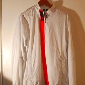 Adidas men's grid Track top. Only worn 2x.Thin, windbreaker material. Size L